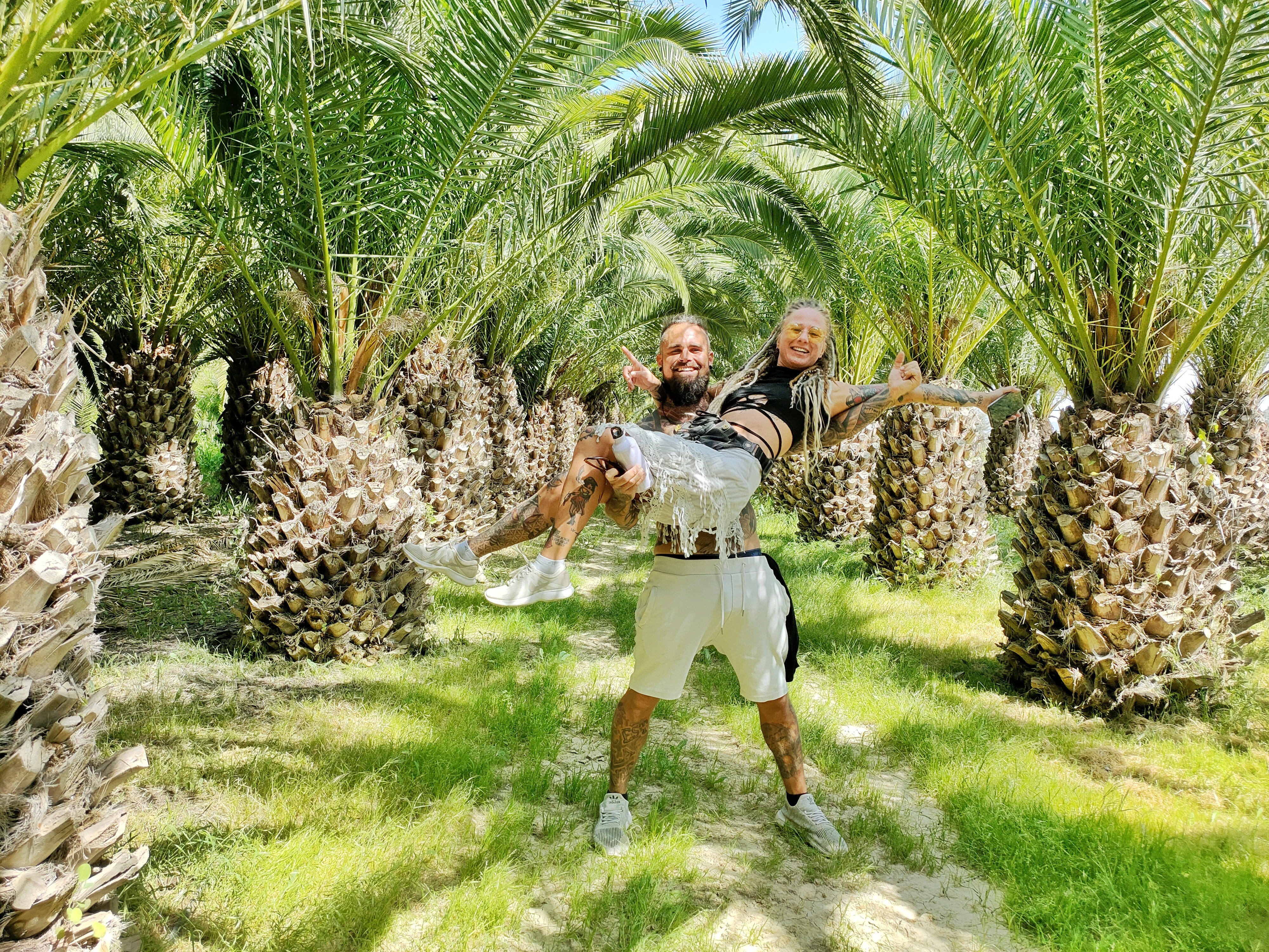 Patrick with a friend in a palm grove on Costa Tropical